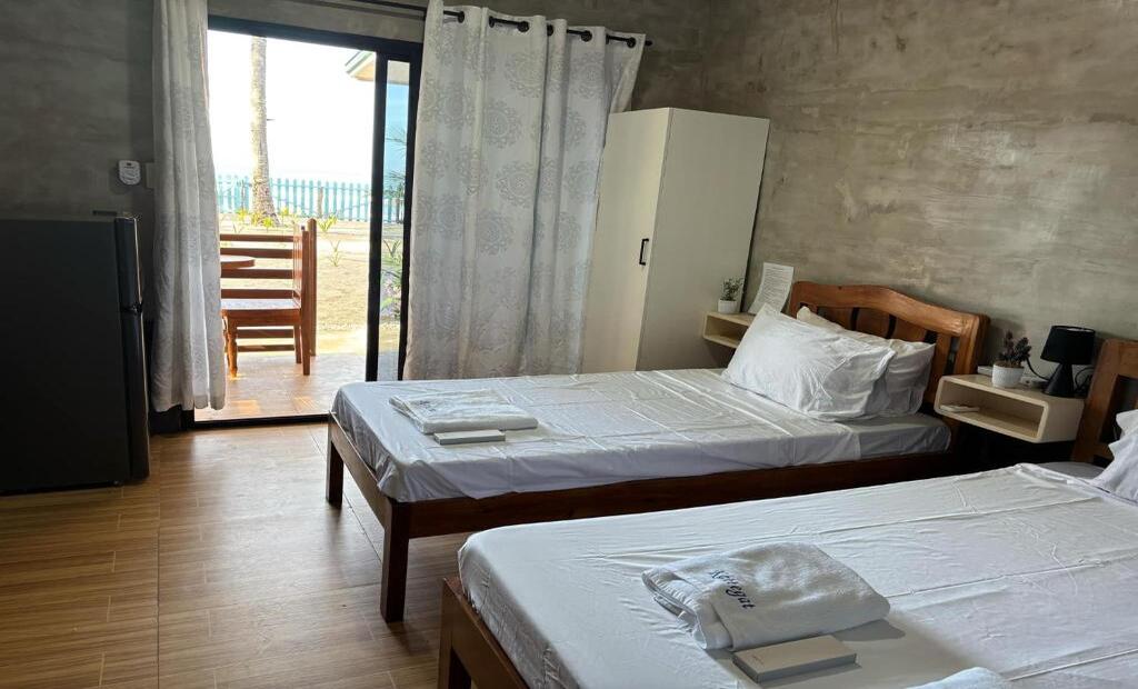Spacious bedroom with ocean view terrace