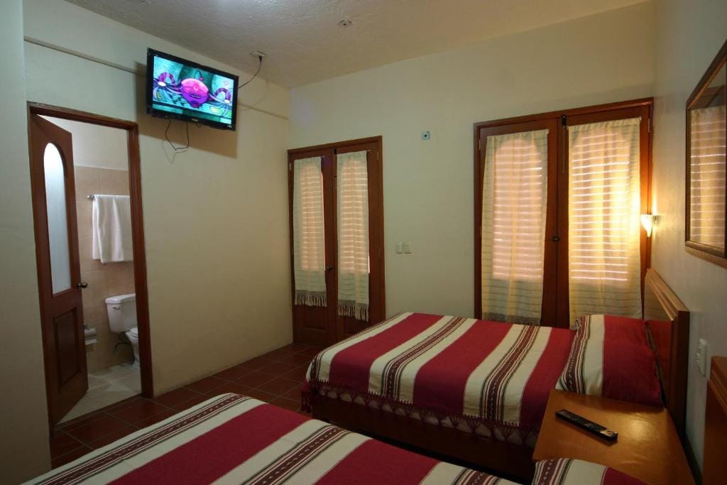 Hotel Oaxaca Mágico guest room with TV