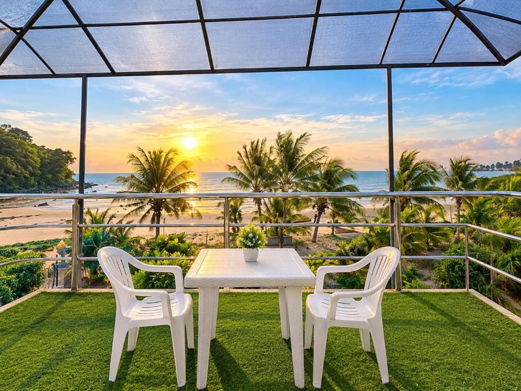 MG Chateau Resort rooftop dining area with ocean view